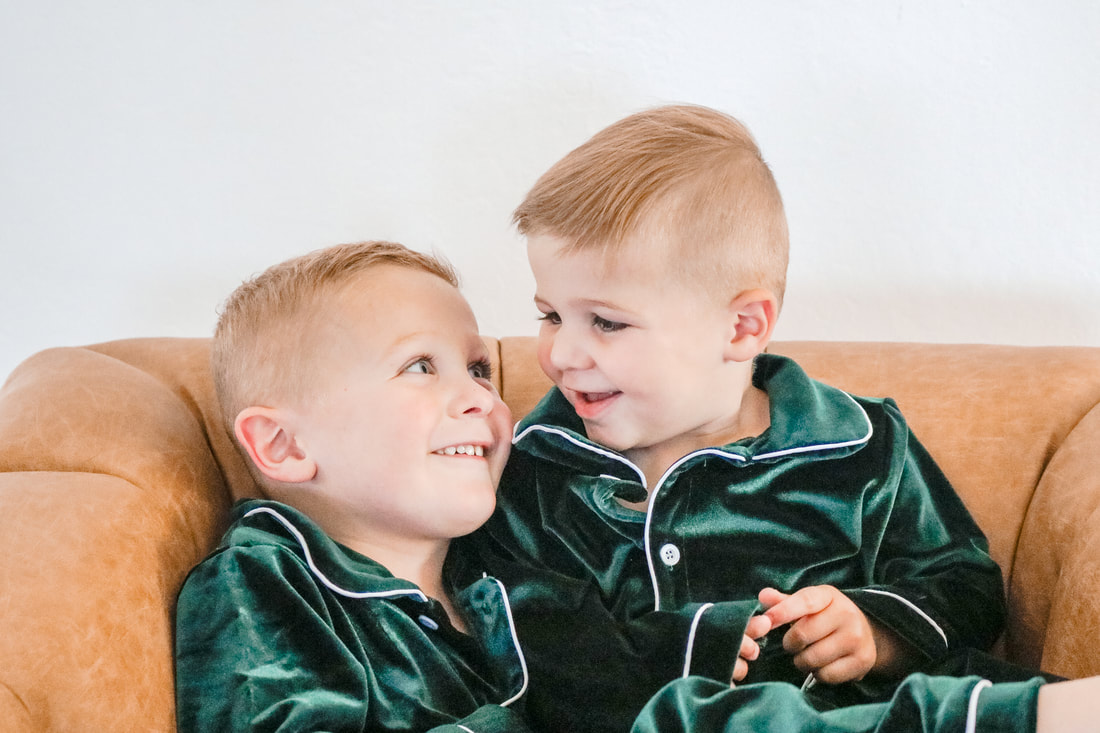 Two brothers in green, studio portrait